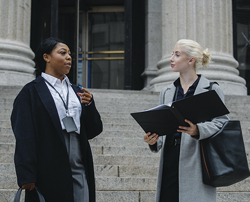 Two lawyers talking to each other