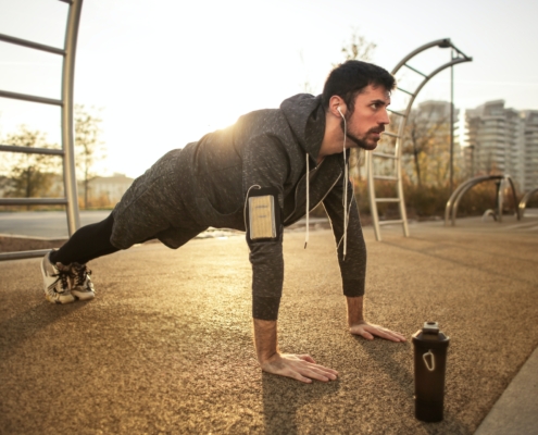 A man exercising outside