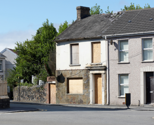 Picture of a boarded up house