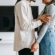 A couple talking in a living room