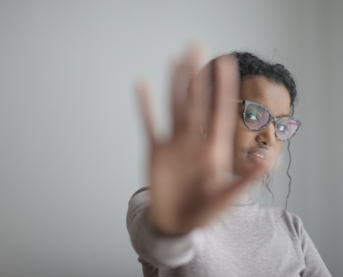 Someone holding up their hand