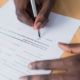 A person signing a document