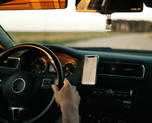 Inside view of someone driving a car