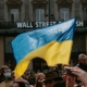 Someone holding a Ukraine flag in a crowd