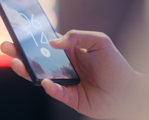 Someone interacting with their mobile phone