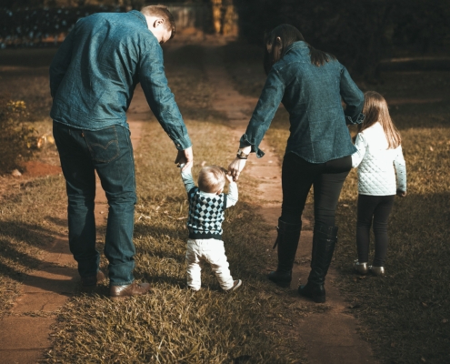 Family walking in the woods