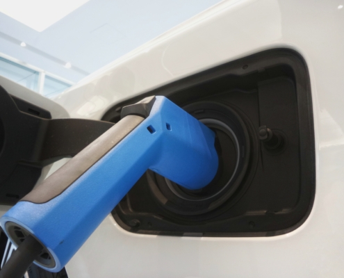 An electric car charging port